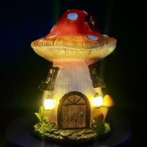 solar toadstool fairy house