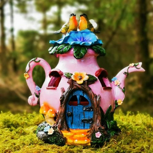 pink teapot fairy house