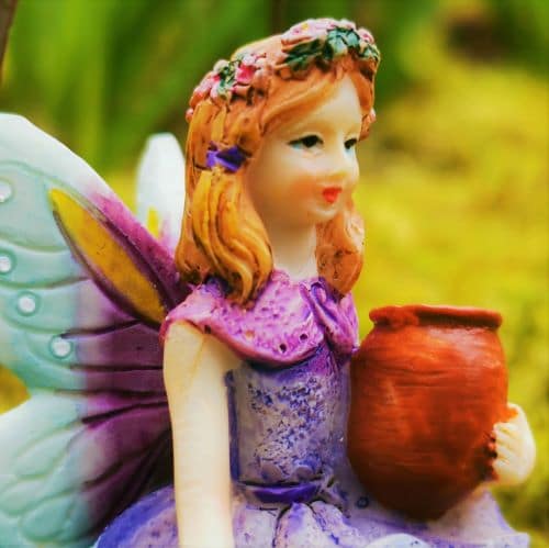 purple fairy figurine