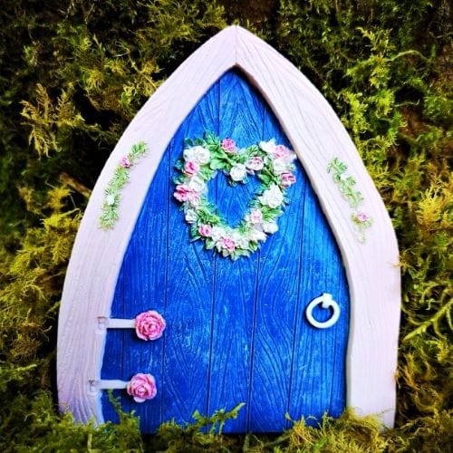 small blue fairy door for the garden