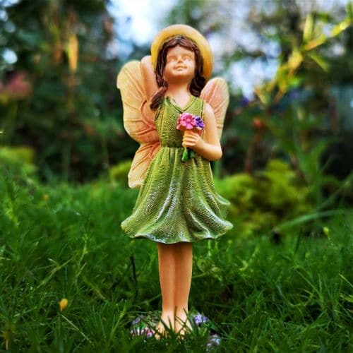 fairy with green dress figurine