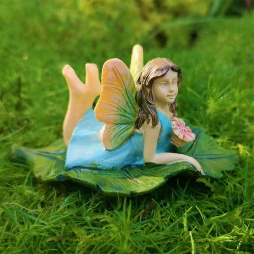 female fairy figurine on a leaf