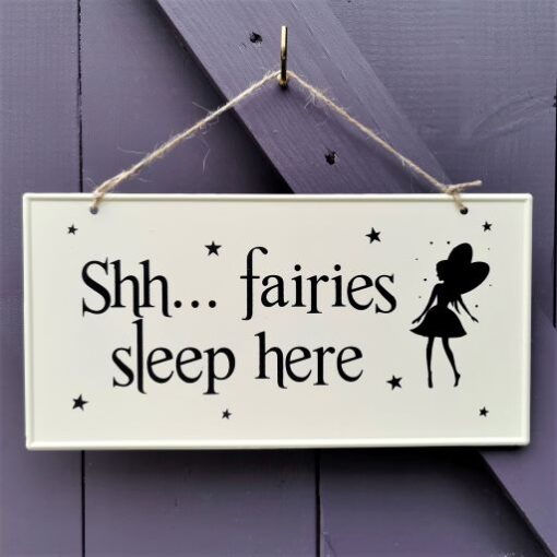 metal fairy sleeping sign