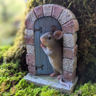 opening fairy door with a mouse